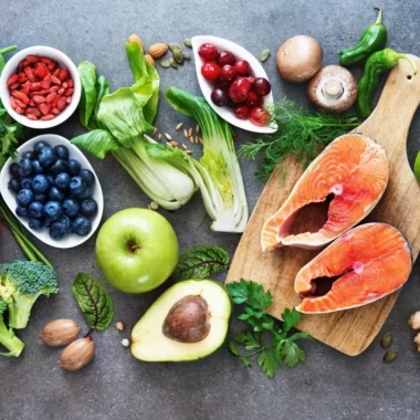 Healthy foods such as salmon, avocadoes, pomegranate, broccoli, ginger nd berries.
