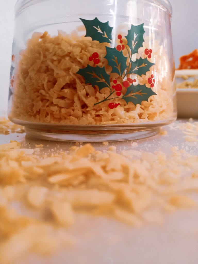 Homemade toasted coconut in a bowl. 