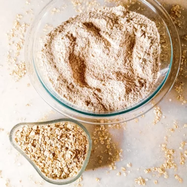 Oat Flour In A Bowl Along With Oats In A Bowl
