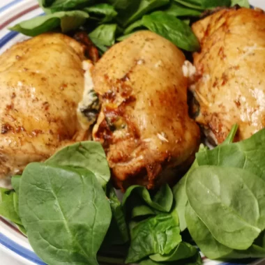 Air Fryer Chicken Breast With Fresh Spinach Leaves