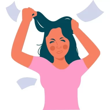 Girl who is pulling out her hair because she is stressed