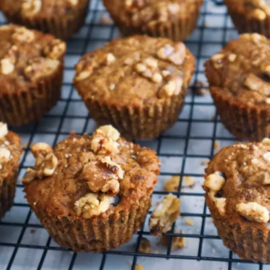 Banana nut muffins on a cooling rack.