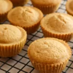 Maple cornbread muffins gluten-free on a cooling rack.