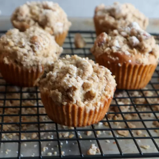 Gluten-Free maple crunch muffins on a cooling rack.