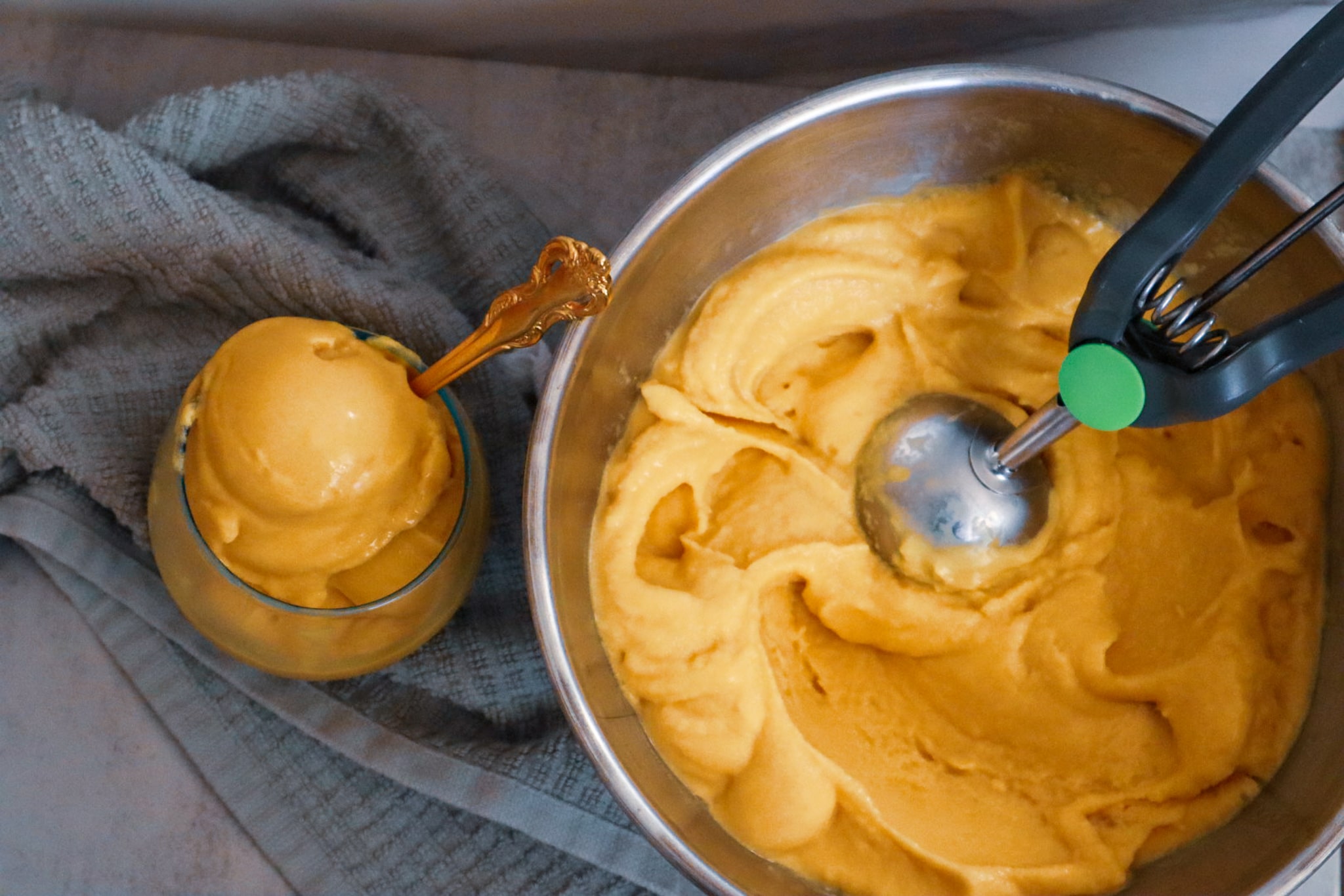 Paleo mango ice cream in a dessert glass.