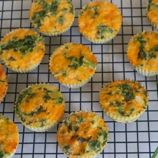 Frittata muffins on a cooling rack,