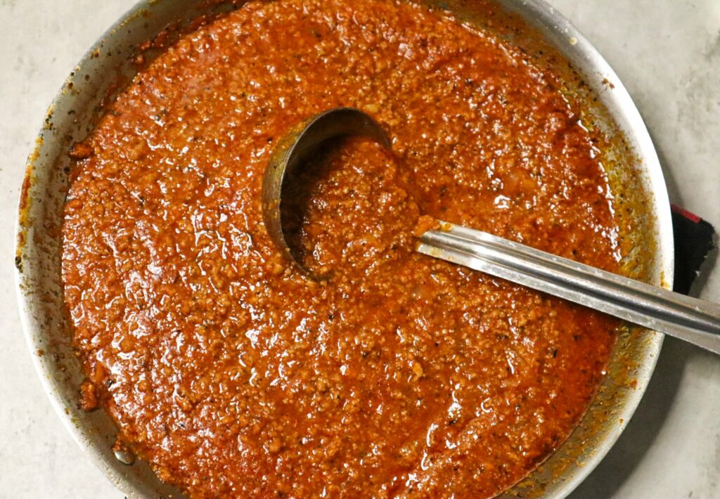 Meat sauce for spaghetti with ground turkey in a skillet.