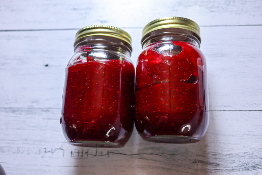 Cranberry jam in Mason jars.
