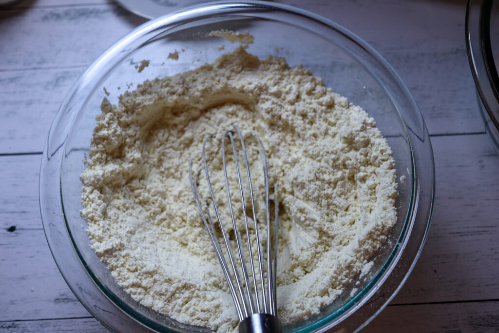 Whisking the dry ingredients in a large bowl.