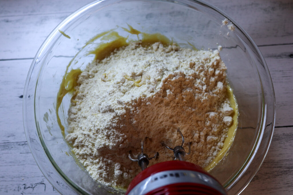 Mixing in the dry ingredients.