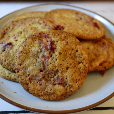 Cranberry jam sugar cookies on a plate.