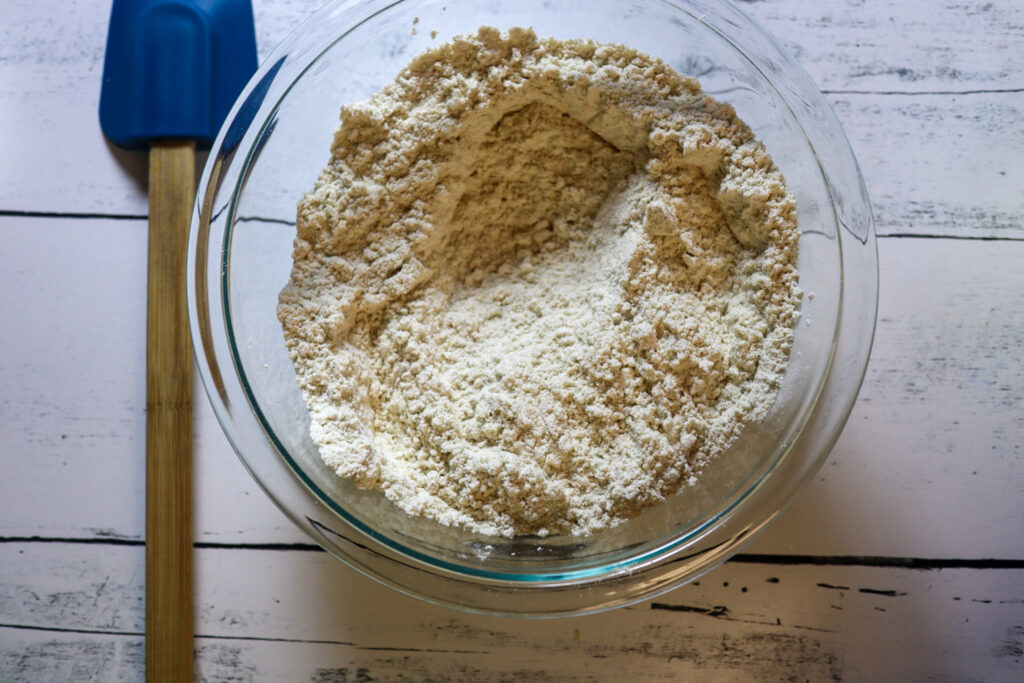 Whisking the dry ingredients together in a medium bowl. 