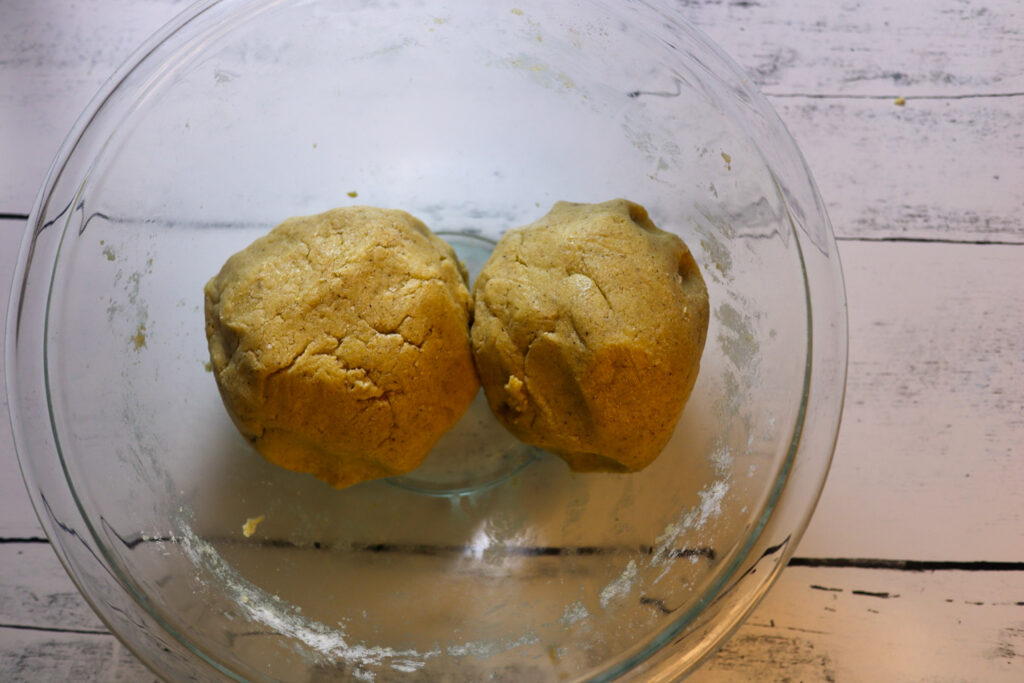 Dividing the cookie dough into 2 portions.
