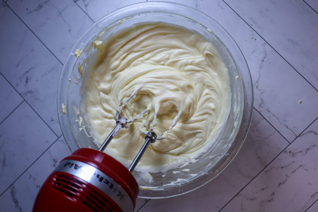 Adding the vanilla extracta nd milk.