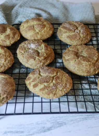 Gluten-free Snickerdoodles on a cooling rack.