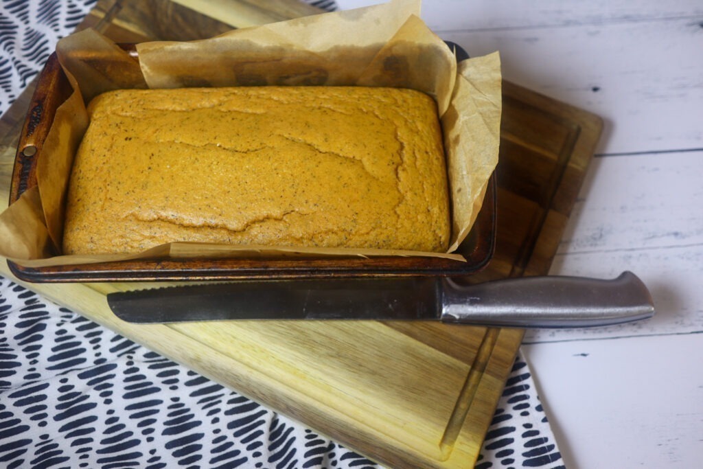 Almond flour bread on a cutting board.