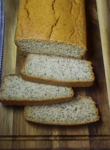 Slices of almond flour bread on a cutting board.