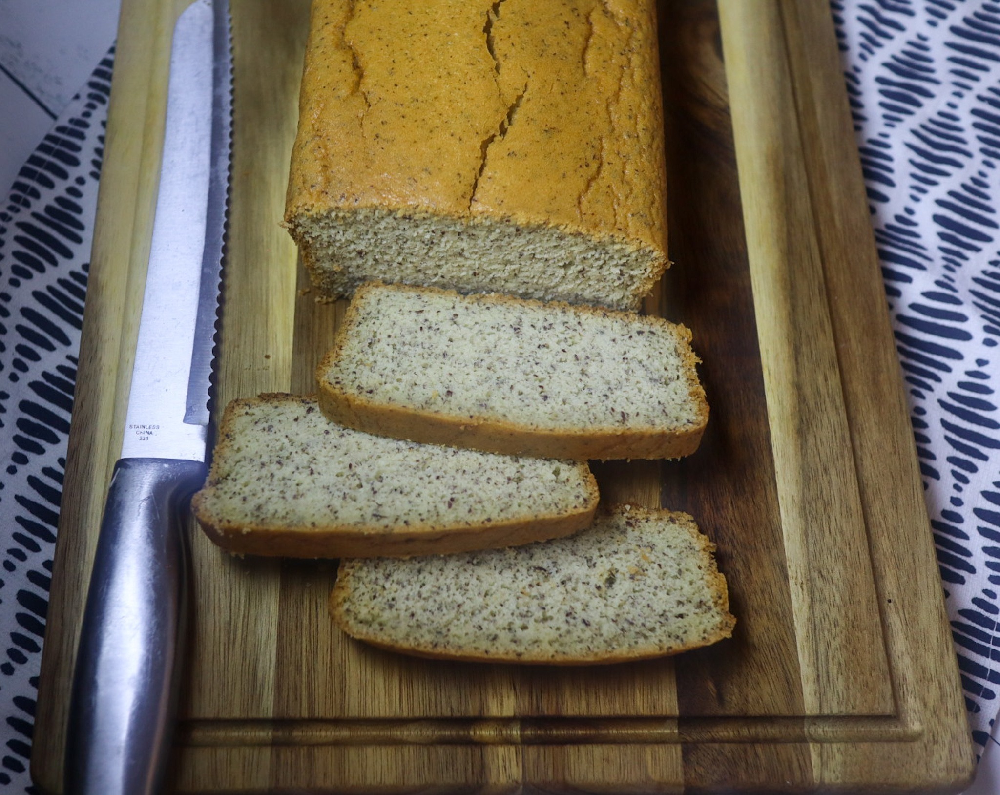Slices of almond flour bread on a cutting board.