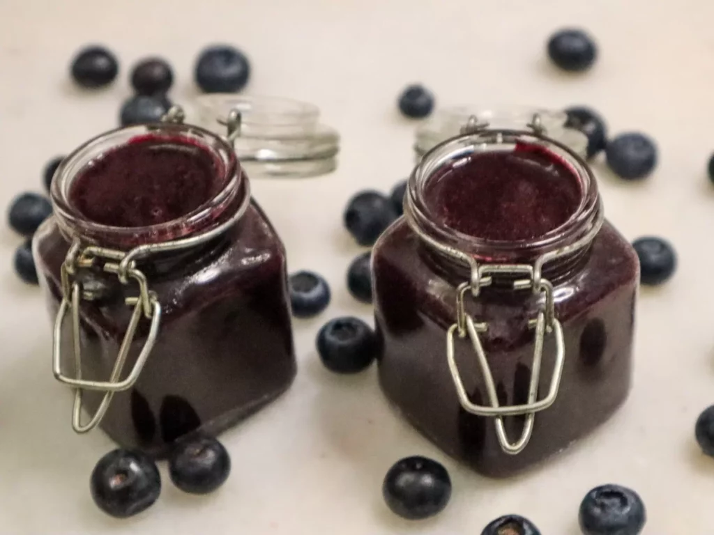 Blueberry butter in jars.