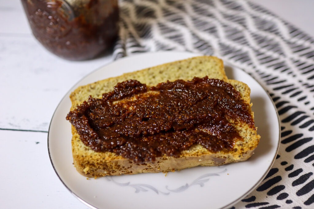 Fig jam made from dried figs spread on almond bread.