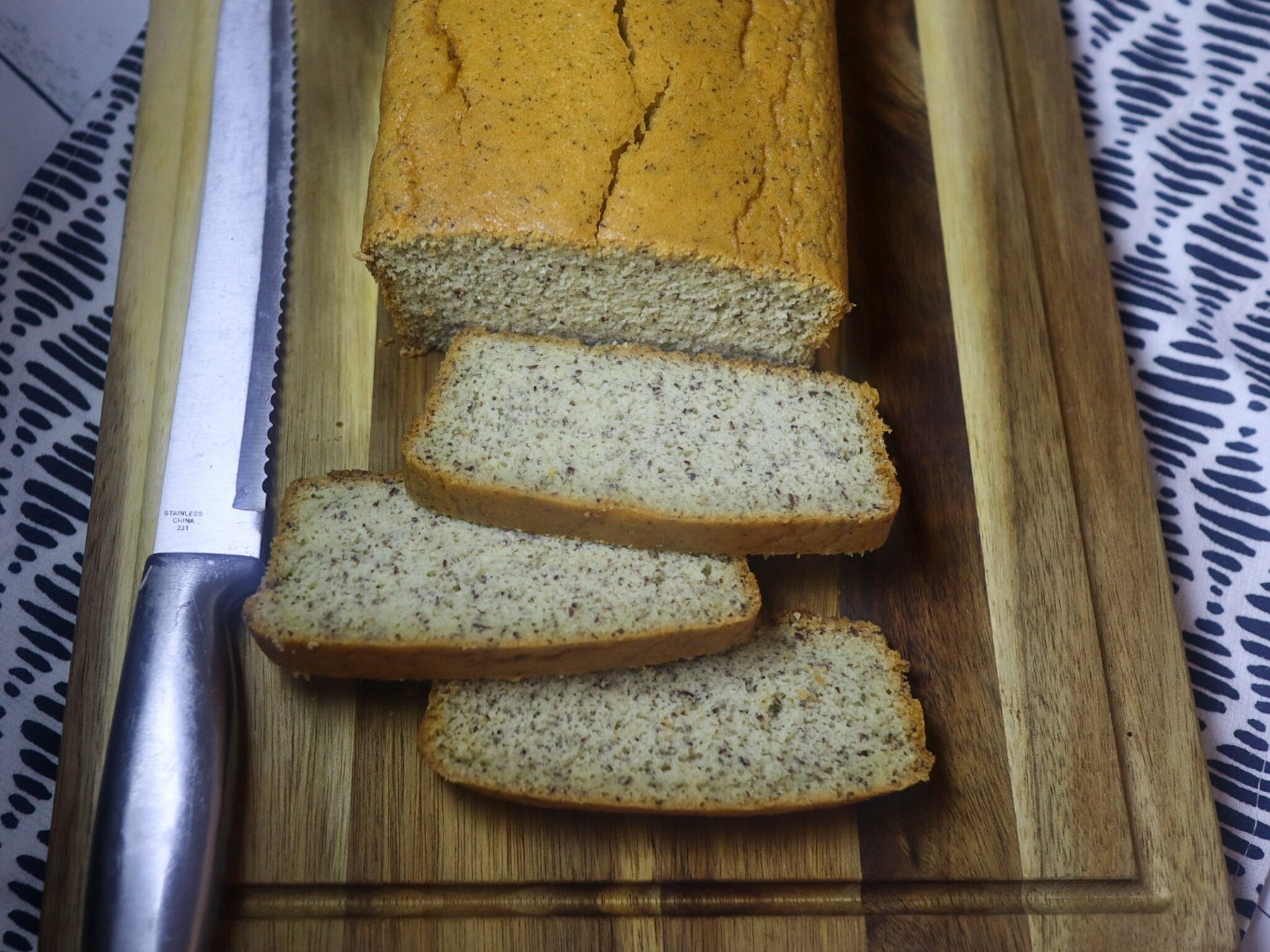 Slices of almond flour bread on a cutting board.