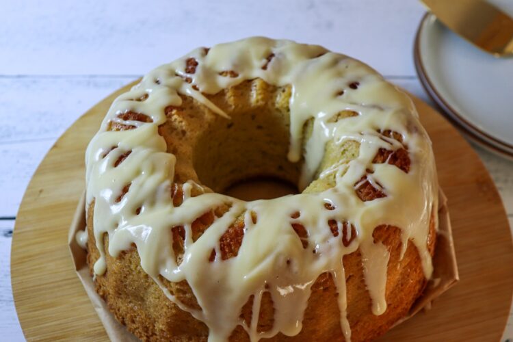 Gluten-free pound cake on a cake stand.