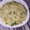 Parsley rice in a serving dish.