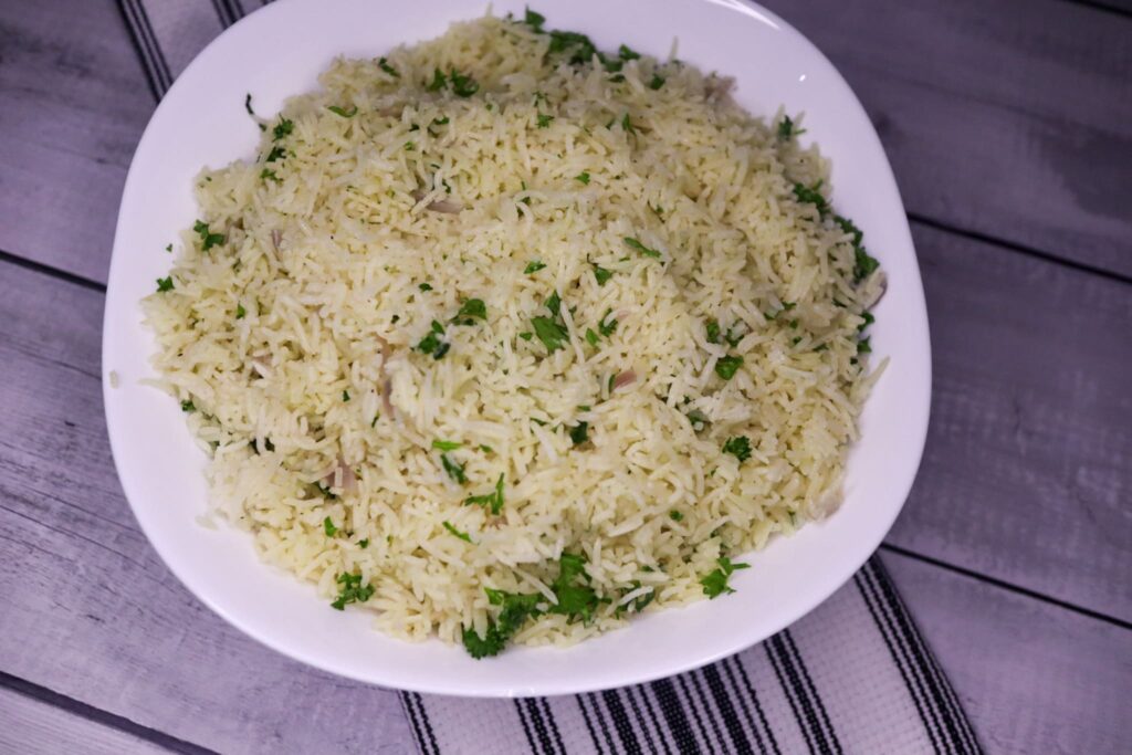 Parsley rice in a serving dish.