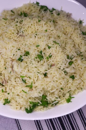 Parsley rice in a serving dish.
