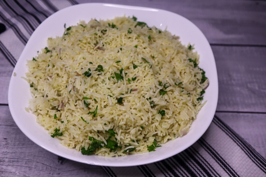 Parsley rice in a serving dish.