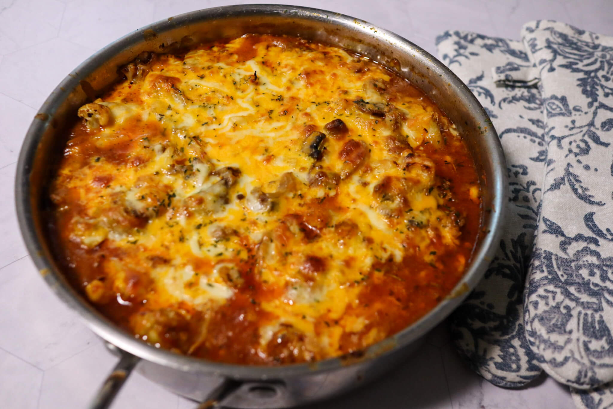 Low-carb beef and vegetable casserole in a skillet.